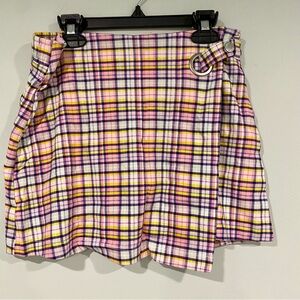 Justice plaid pink and yellow skort. Pull-on, elastic waistband. Girls size 14